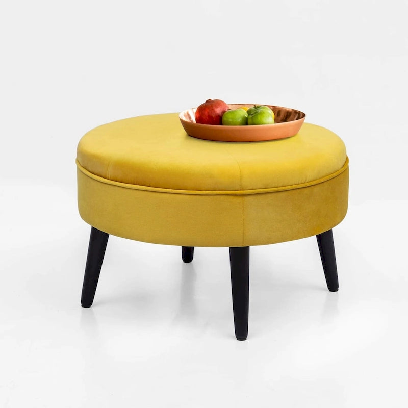 Pouf rond en tissu capitonné