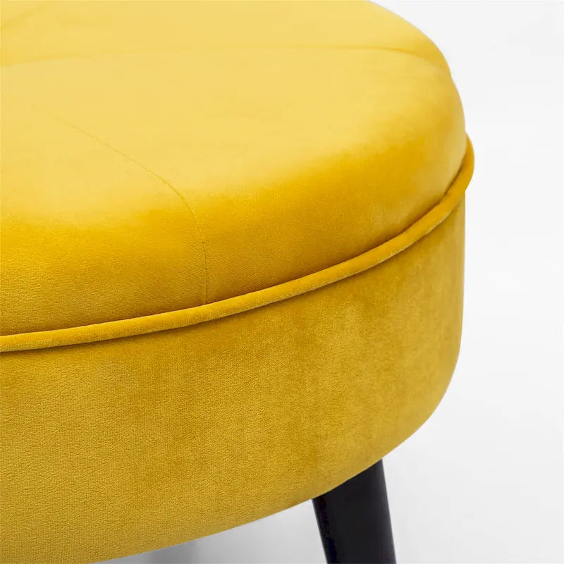 Pouf rond en tissu capitonné