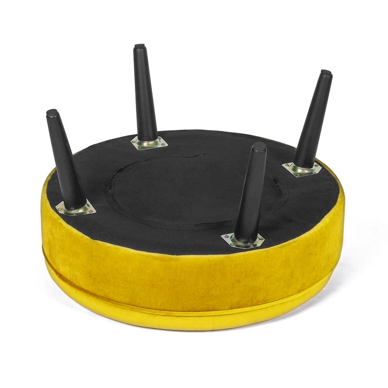 Pouf rond en tissu capitonné