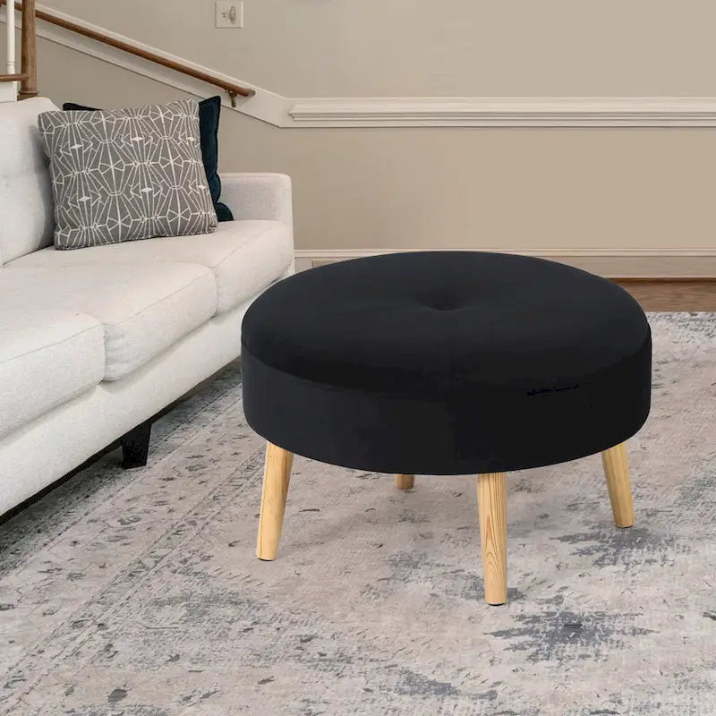 Pouf rond en tissu capitonné