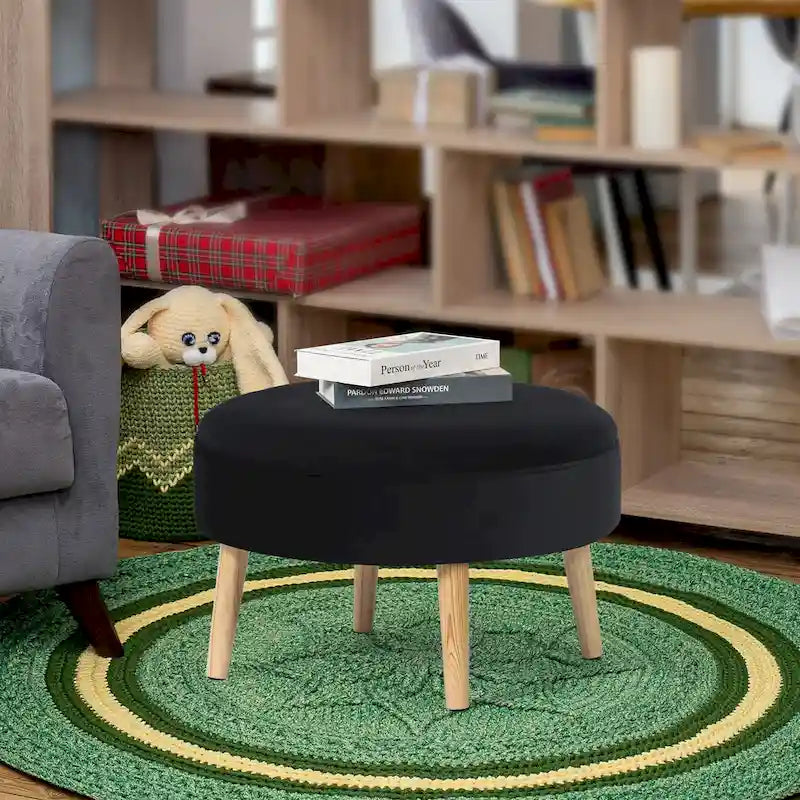 Pouf rond en tissu capitonné