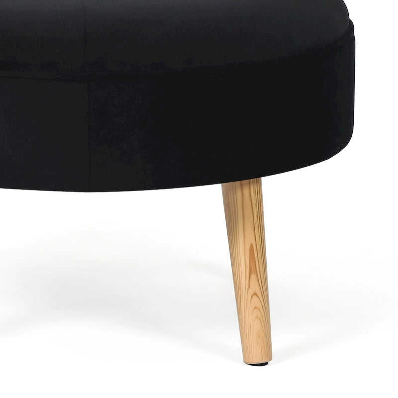 Pouf rond en tissu capitonné