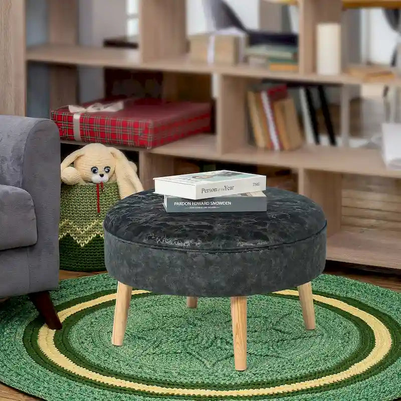 Pouf rond en tissu capitonné