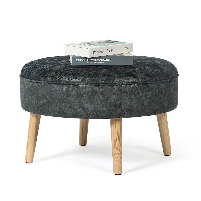 Pouf rond en tissu capitonné
